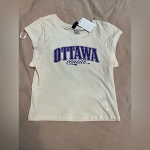 Cream baby tee. Super cute with tag